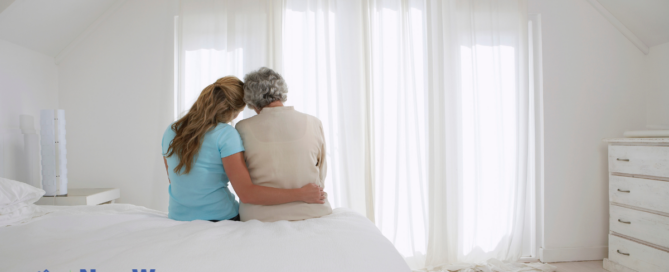 A family caregiver hugs her loved one and is better able to enjoy her time with her after taking a break by using respite care services.