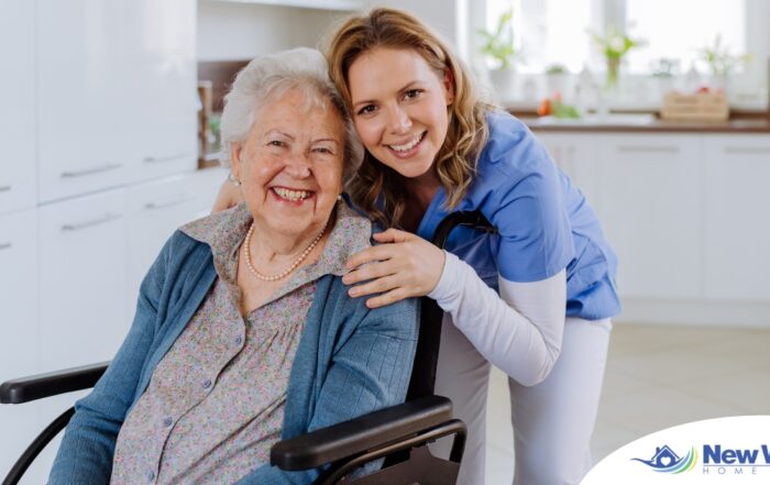 A caregiver enjoys her job as she smiles with a happy client representing the joy that can come from a home care career.